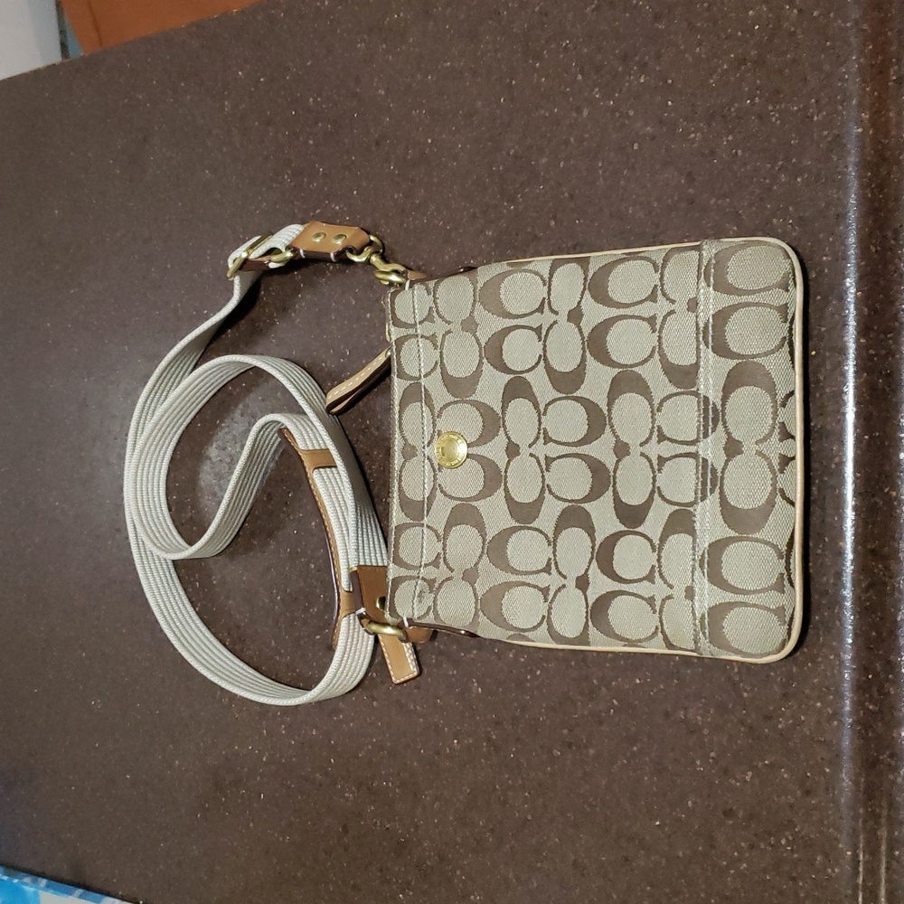 *COACH Logo Signature Crossbody Bag.  A0723-10250